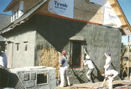 Pictue of crew doing the stucco